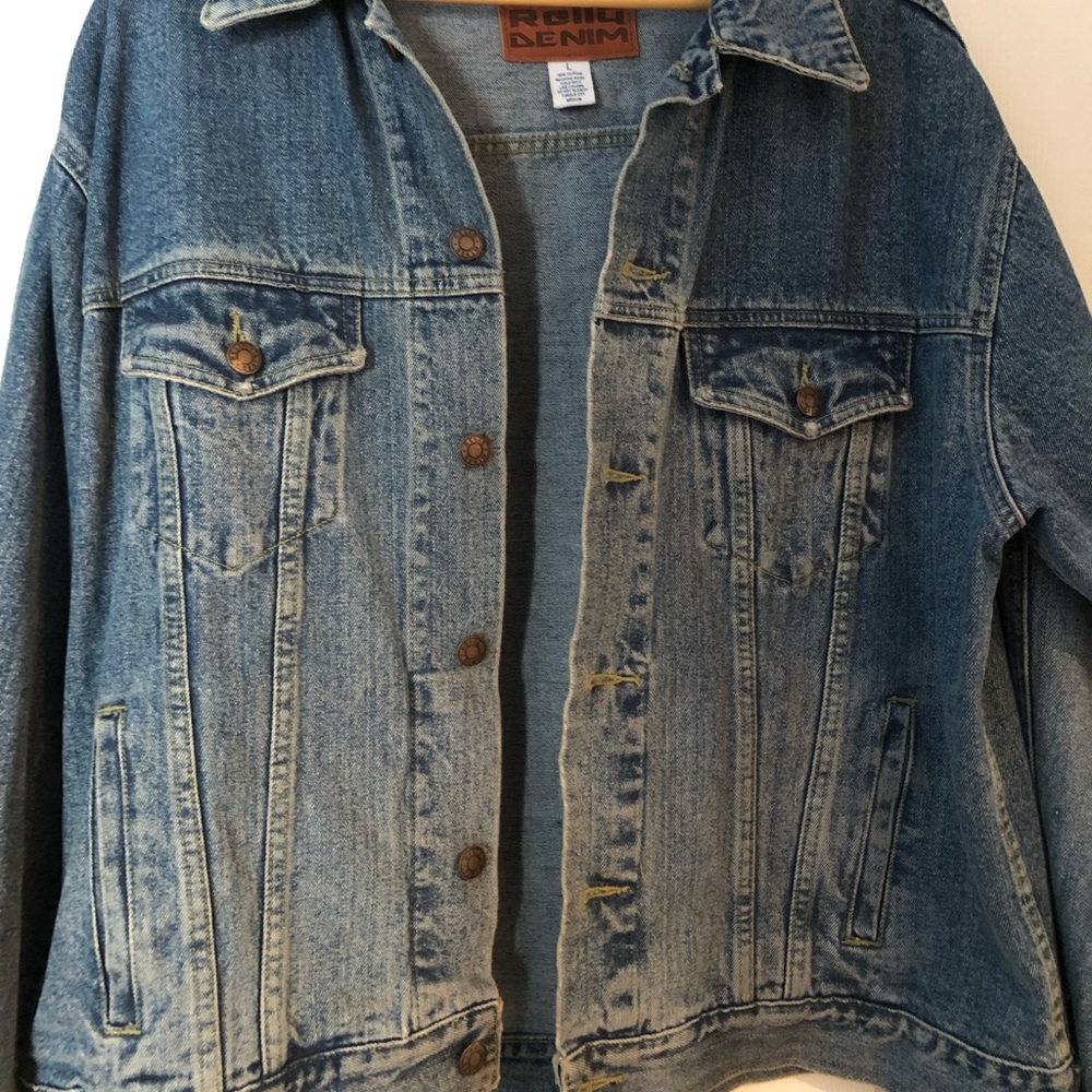 Somewhat distressed Mens jean jacket with Harley Davidson Logo on the back